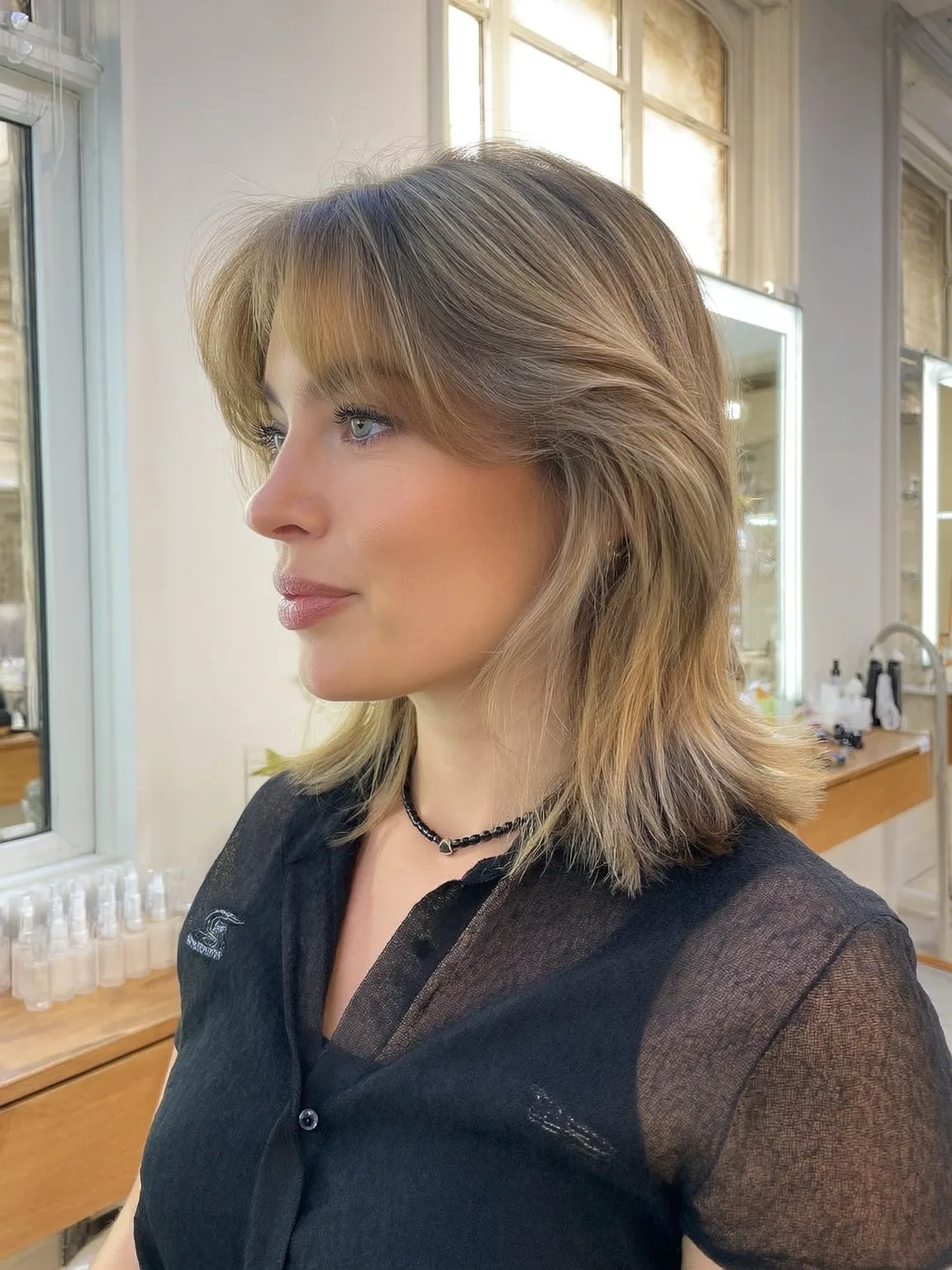 Soft Feathered Layers with Honey Blonde Balayage